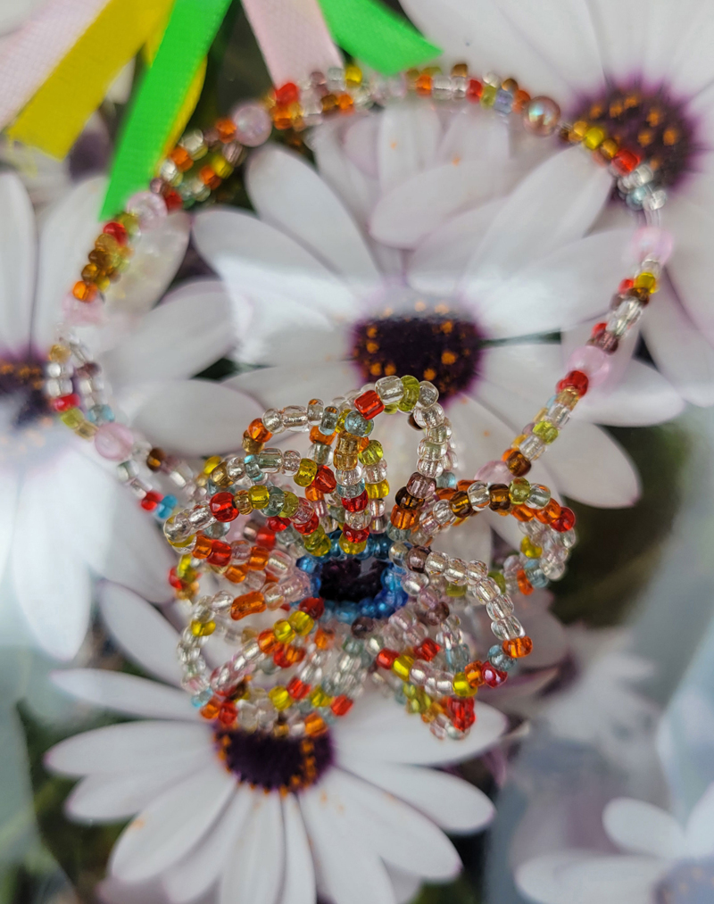 Bracelet en forme de fleur avec des perles de rocaille